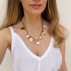 Look at this stuff isn’t it neat? A collection of pearls, seashells and charms, hanging from chunky gold chain, gives the option to continue your collection of shells or wear as is. Inspired by the beauty of captiva and it’s sea filled beaches, this necklace is all that’s glamorous about nature and summer. 18” long Gold filled charms and gold filled chains. Made in Miami Seashell Design, Chunky Gold Chain, Indie Jewelry, Choker Pendant, Pearls Of Wisdom, Pearls Necklace, Summer Essential, Fresh Water Pearls, About Nature