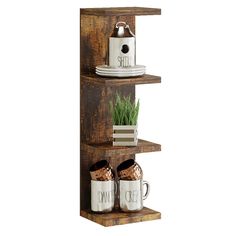 three tiered wooden shelf with coffee mugs and books on it, one has a birdhouse