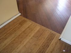 an empty room with hard wood flooring and white trim on the walls, along with hardwood floors