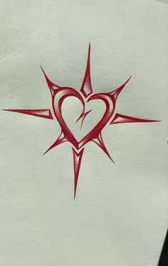 a drawing of a heart and star on a piece of white paper with red ink