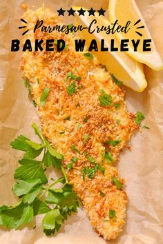 Baked walleye on parchment paper with lemon wedges and cilatro on the side. Oven Baked Walleye, Parmesan Crusted Fish, Cooked Fish