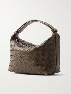 Find BOTTEGA VENETA Mini Wallace Intrecciato Leather Shoulder Bag on Editorialist. Bottega Veneta's 'Mini Wallace' bag is crafted from leather using its signature intrecciato technique - the iconic weave has defined the brand's accessories since the early '70s. The bag features a top handle and a zip closure. It is a mini bag perfect for holding essential items. Bottega Wallace, Chic Brown Bags With Intrecciato Weave, Versatile Leather Shoulder Bag With Intrecciato Weave, Green Intrecciato Weave Bag, Luxury Green Intrecciato Weave Bag, Brown Intrecciato Weave Shoulder Bag, Bag Light, Mini Shoulder Bag, Designer Handbags