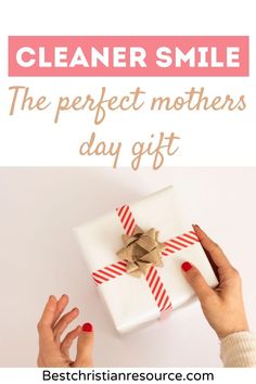 two hands holding a wrapped present box with the words unique gift ideas under $ 100