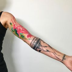 a person with a tattoo on their arm