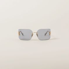 Light Gray Lenses Runway Sunglasses | Miu Miu Rimless Shield Sunglasses With Mirrored Lenses, Rimless Clear Shield Sunglasses With Uva Protection, Clear Rimless Shield Sunglasses With Uva Protection, Rimless Glass Shield Sunglasses With Tinted Lenses, Rimless Glass Shield Sunglasses With Uva Protection, Modern Miu Miu Sunglasses, Modern Miu Miu Sunglasses With Glass Lenses, Modern Miu Miu Sunglasses With Glass Material, Miu Miu Sunglasses With Mirrored Lenses