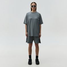 Oversized unisex t-shirt. The soft and breathable cotton material ensures all-day comfort, while the oversized fit that is flattering on all body types. Features a unique print in ALMZV edition. Material: 95% cotton, 5% elastane Model wears: M sizeModels height: 173 cm Grey Man, Short Leggings, Grey Women, Unique Print, Short Pants, Body Types, Cotton Material, Unisex T Shirt, Gray Color