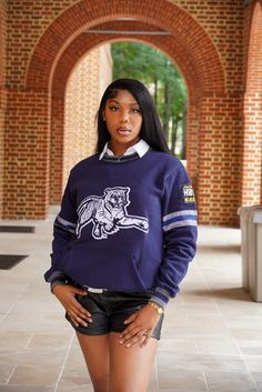 Wrap yourself in comfort and pride with our HBCU Cotton Chenille Logo Sweater. This sweater effortlessly combines cozy comfort with collegiate style, making it an essential addition to your wardrobe. Key Features: Premium Cotton Fabric: Made from high-quality cotton, this sweater offers exceptional softness and breathability, ensuring all-day comfort.Chenille Logo: The front features a beautifully crafted chenille logo that adds a touch of texture and sophistication, proudly displaying your HBCU Sporty Tops For Campus During Sports Season, Cozy Fit Sporty Sweater For Streetwear, Fall Varsity Sweatshirt In French Terry, Varsity French Terry Sweatshirt For Fall, Winter College Style Sweater For Campus, Collegiate Sweater For Game Day In Fall, Collegiate Fall Sweater For Game Day, Collegiate Style Sweater For Game Day In Fall, Collegiate Hoodie With Relaxed Fit For Fall