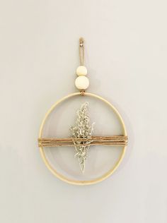 a cross hanging on a wall in a circle