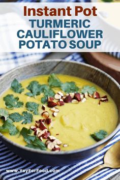 a bowl filled with yellow soup and garnished with cilantro