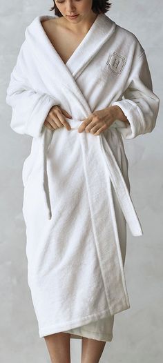 For a skin-pampering indulgence that rivals a day at the spa, wrap yourself in our ultra-soft robe. The robe features a plush 280 gsm in luxuriously absorbent Turkish cotton and an ultra poly-fleece exterior for sumptuous warmth and relaxation après shower. Woven in a soft cotton blend, our Resort Plush Slippers are a perfect match. Cotton Long Sleeve Robe For Spa, Long Sleeve Cotton Spa Robe, Long Sleeve Cotton Robe For Spa, White Long Sleeve Bathrobe, White Long Sleeve Bath Robe, Long Sleeve Cotton Robe For Wellness, Cozy White Robe For Relaxation, White Long Sleeve Robe For Loungewear, White Cozy Sleep Robe