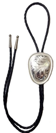 Shop Western Silver Engraved Bolo Tie with engraving on a 36-inch black braided leather cord. Get the best deal with 30 days return policy from Wild West Living. Silver Lariat Bolo Tie With Adjustable Length, Silver Lariat Bolo Ties With Adjustable Length, Southwestern Style Formal Bolo Tie, Western Silver Bolo Tie With Sliding Knot, Southwestern Style Adjustable Bolo Tie For Formal Occasions, Adjustable Southwestern Bolo Tie For Formal Occasions, Silver Lariat Bolo Tie For Gift, Western Silver Lariat Bolo Ties, Silver Bolo Tie With Sliding Knot As Gift