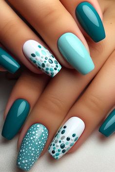 Add a touch of fun to your summer style with this adorable teal nail design featuring playful polka dots! Perfect for a fresh and trendy look, these simple yet eye-catching ideas will make your nails pop. Get inspired to try out this charming summer trend! 🎨🌸 #SummerNails #TealNailDesigns #PolkaDotNails #NailInspiration Teal Nail Designs, Teal Nails, Dots Nails, Gel Nail Designs, Chic Nails, Nail Designs Summer