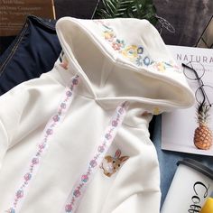 Sweet Rabbit Flowers Hoodie PN1890 ●Size: Length 54 cm,bust 98 cm,shoulder 51 cm,sleeve 52 cm. ●Material:cotton ●About Shipping: We attach great importance to the orders of each customer and parcel delivery. 1.Processing time: 2-3 business days. 2.Shipping time: 10-15 business days to US, please allow 3-4 weeks shipping to other country.(Shipping times can be affected by variable customs clearance times or public holidays.) Cute Hooded Cotton Sweater, Cute Cotton Hooded Sweatshirt, Cotton Hooded Sweater, Cute Cotton Winter Hoodie, White Cotton Hoodie Sweater, Cute White Hooded Jacket With Long Sleeves, Cute White Long Sleeve Hooded Jacket, Cute Cotton Hoodie For Winter, Cute Long Sleeve Top With Drawstring Hood