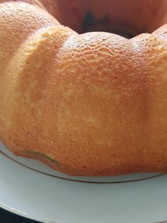 a bundt cake sitting on top of a white plate