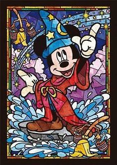 mickey mouse in stained glass with stars and moon on it's head, holding a broom