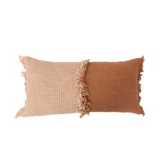 two pillows with fringes on them, one in brown and the other in beige