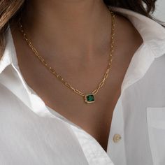 "Make a statement with this stunning necklace! Featuring an emerald pendant and paperclip chain. It will instantly transform your outfit!  - - - D E T A I L S - - - * 14k Gold or Rhodium plated brass - we use a THICK plating of 14k Gold and Rhodium for a piece that will be with you for years to come! * Emerald Stone: 8x10mm * 16\" + 3\" Ext * Nickel-free & Hypoallergenic * Lobster clasp Closure Necklaces on Model: https://www.etsy.com/listing/906768350/solitaire-necklace-dainty-bezel-necklace?click_key=8861cf7a6ca15ae17b47f35da89871a3fa28ed1a%3A906768350&click_sum=aafcdf8d&ref=shop_home_active_8&pro=1&sts=1 https://www.etsy.com/listing/1238983032/dainty-necklace-minimalist-necklace?click_key=98ded69e7dba1ff49feaa83b5a262a090c5a0a6f%3A1238983032&click_sum=57cb82ff&ref=shop_home_active_34&pr Gold Emerald Necklace, Simple Beaded Necklaces, Schmuck Gold, Emerald Necklace Pendant, Bezel Necklace, Solitaire Necklaces, Emerald Pendant, May Birthstone, Necklace Simple