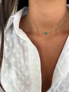 This stunning choker necklace sits elegantly close to the neck, featuring a captivating green solitaire pendant that adds a unique touch of sophistication. Crafted from 925 sterling silver, the necklace is available in both 14K yellow gold and rose gold plating, adorned with a sparkling green zircon stone for a pop of color and brilliance. Perfect for evening events, weddings, or adding a refined detail to everyday outfits, this choker makes a thoughtful gift for a wife, girlfriend, or any speci Round Emerald Necklace As Gift, Fine Jewelry Solitaire Necklace With Delicate Chain For Gift, Fine Jewelry Solitaire Necklace With Clavicle Chain As Gift, Sterling Silver Emerald Necklace, Fine Jewelry Solitaire Necklace With Clavicle Chain, Delicate Chain Emerald Necklace For May Birthstone, Dainty Emerald Necklace With Round Pendant, May Birthstone Necklace With Clavicle Chain, Dainty Solitaire Necklace With Adjustable Chain As Gift