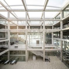 the inside of a large building with lots of windows