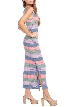 Enjoy some cabana time in this cover-up dress crafted from an openwork crochet with wide, multicolored stripes. Scoop neck Sleeveless 100% acrylic Hand wash, dry flat Made in Peru Hispanic & Latinx Owned/Founded Multicolor Crochet Beach Dress, Multicolor Beachy Crochet Dress For Beach Season, Multicolor Crochet Sundress For Beach, Multicolor Crochet Sundress For The Beach, Sleeveless Multicolor Crochet Beach Dress, Multicolor Sleeveless Crochet Dress For Beach Cover-up, Multicolor Sleeveless Crochet Dress For Beach, Blue Crochet Maxi Dress For Beach, Blue Maxi Crochet Dress For Beach