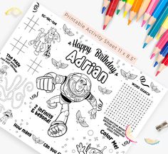 the printable activity sheet is next to colored pencils