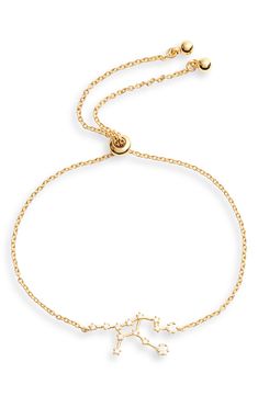 a gold bracelet with an animal charm on the end and a chain attached to it