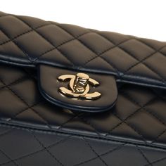 Hello gorgeous...uh...we mean flawless. The mini rectanglar flap bag is...an absolute vision. We love her, to say the very least. Crafted from navy lambskin leather with champagne gold hardware, this perfect little baby is definitely hard to get your hands on. The perfect accessory for basically anything, this mini Chanel is the ideal complement to any outfit for any occasion. Wear her with a cocktail dress and a pair of heels, or with black trousers with a silk blouse, or even with a pair of jeans and a basic tee - no matter what, this gorgeous bag is a suitable compliment. I mean, you can basically wear a plastic bag and you'll still look bomb with the mini rectangle by your side. A bag you'll wear and love forever, investing in a Classic Flap is always a good idea given that they rarely Champagne Gold Hardware, Mini Chanel, Chanel Classic Flap Bag, Classic Flap Bag, Navy Leather, Hello Gorgeous, Black Trousers, Timeless Handbag, Gorgeous Bags