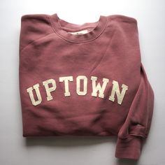 "The perfect vintage style sweatshirt that's already broken in with top stitched felt lettering. - This mauve unisex crewneck sweatshirt is so cozy and has that perfect, \"been washed 100 times\" look! The lettering is ivory wool felt top stitched to secure it to the front of the sweatshirt. Left sleeve has a cute embroidered pennant  ;) - Unisex sizing means that for WOMEN I recommend ordering a size smaller than your standard size or for an oversized look order your standard size. - Unisex siz Vintage Fall Sweater With Letter Print, Vintage Letter Print Sweater For Fall, College Fall Sweatshirt With Letter Patch, Vintage Letter Embroidery Sweatshirt For Streetwear, Fall Varsity Sweatshirt In French Terry, Varsity French Terry Sweatshirt For Fall, Vintage College Sweatshirt With Text Print, Vintage Sweatshirt With Text Print In Relaxed Fit, Vintage Sweatshirt With Lettering In Relaxed Fit