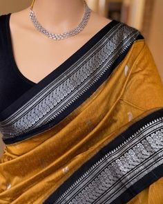 PRODUCT DETAILS Saree Description: Golden yellow silk cotton saree with contrast Silver black   zari border.  Comes with contrast black blouse. Saree height: 46 inches. Saree length: 5.5 meters. Blouse : 80cm Care: Normal wash * Occasions: Wedding Wear, Party Wear, Festive Wear, Durga Puja, Indian Wear, Sangeet Wear, Bridal Wear, Chrismas Day, Mothers Day, Haldi Wear, Karwachauth Blouse, Christmas Gifts NOTE *Actual color may vary slightly from your monitor. *We dispatch the product within 5 day Yellow Saree With Black Border, Yellow Saree Black Blouse, Traditional Slub Silk Pre-draped Saree For Party, Elegant Cotton Silk Pre-draped Saree With Border, Traditional Party Pre-draped Slub Silk Saree, Yellow Saree With Black Blouse, Party Saree In Slub Silk With Zari Weaving, Slub Silk Saree With Cutdana For Party, Cotton Silk Pre-draped Saree With Pallu For Celebration