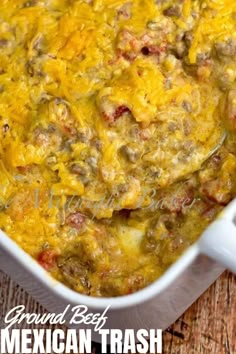 a casserole dish with meat and cheese in it