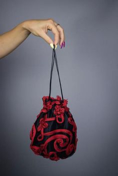 Elegant satin wristlet bag / money bag / purse ! Ideal for your wedding day, night out, party ,special occasion Color: black and red Decorated with gorgeous organza flowers Fabric : satin and organza Lining : poliester Closes and opens due to elastic , very comfortable for aduls and and children. Size : approx. 18 cm x 18 cm We accept credit cards! Black Pouch Clutch For Wedding, Black Evening Pouch With Dust Bag, Elegant Black Handheld Pouch, Black Handheld Pouch For Party, Rectangular Satin Evening Bag For Party, Chic Silk Bag For Events, Elegant Silk Party Bags, Black Handheld Pouch For Formal Occasions, Black Pouch Evening Bag For Wedding