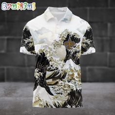 a shirt with an image of the great wave in white, black and gold colors