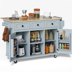 a blue kitchen island with lots of drawers