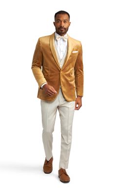 A slim gold velvet tuxedo coat with one button and a shawl lapel. Luxury Long Sleeve Silk Tuxedo, Luxury Gold Ceremony Blazer, Luxury Gold Tuxedo For Formal Occasions, Luxury Fitted Gold Tuxedo, Luxury Gold Tuxedo Blazer, Luxury Notch Lapel Suits With Gold Buttons, Luxury Silk Evening Tuxedo, Tuxedo Coat, Button Shawl