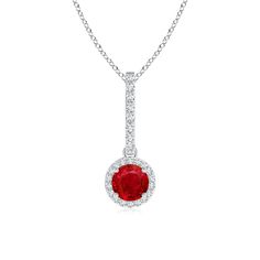 Dangling from a diamond encrusted bale is a round crimson ruby, framed in a glittering halo of diamonds. Prong set in 14k white gold, the precious diamonds and the sparkling bright red gemstone create an ethereal effect. This vintage ruby pendant exudes a radiant aura. Ruby Diamond Pendant, Pink Sapphire Pendant, Sapphire Diamond Pendant, Platinum Chain, Ruby Pendant, Halo Pendant, Red Gemstones, Pink Gemstones, Diamond Pendant Necklace