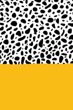 a black and white animal print pattern on a yellow background with an orange rectangle