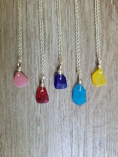 Adorn your neck with this unique minimalist necklace made from genuine rare colored sea glass. The pendants are small and measure about 1 inch. The sea glass is 1/2 to 3/4 of an inch. It comes on a sterling silver 18 inch chain. Choose from red, pink, yellow, turquoise, and cobalt blue. This comes in a box and is ready to gift. Yellow Turquoise, Sea Glass Necklace, Necklace Dainty, Sea Glass Jewelry, Minimalist Necklace, Necklace Sterling Silver, Glass Necklace, Dainty Necklace, Glass Jewelry