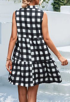 The Emes Shop dress is detailed withï»?/strong>﻿a classic gingham print. Features a v neck line. sleeveless. straight cut silhouette. tiered design. and above knee length. Pair it with a handbag and sandals for a fabulous look.MATERIAL:95% Polyester 5% SpandexMEASUREMENTS: Product Length 34.5"-36.5"in 4-6-Small | Waist: 25"-26.5"in | Chest: 33"-34.5"in | Hips: 33.5"-35"in 6-8-Medium | Waist: 26.5"-28"in | Chest: 34.5"-36"in | Hips: 35"-36.5"in 8-10-Large | Waist: 28"-29.5"in | Chest: 36"-37.5"in Sleeveless Black Plaid Dress For Spring, Sleeveless Plaid Dress With Ruffle Hem, Plaid V-neck Mini Dress For Picnic, Plaid Sleeveless Dress With Ruffle Hem, Gingham V-neck Dress With Ruffles, V-neck Gingham Plaid Dress For Picnic, Gingham Plaid V-neck Dress For Picnic, Casual Sleeveless Plaid Dress With Ruffles, Summer Gingham Plaid Dress With V-neck