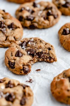 chocolate chip cookies are on the table ready to be eaten