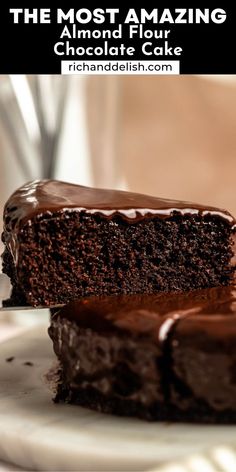 two pieces of chocolate cake sitting on top of a white plate next to each other