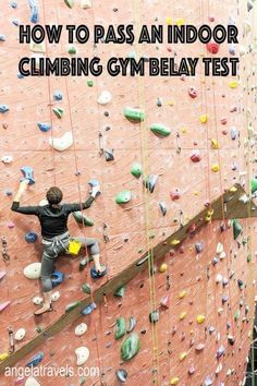 a man climbing up the side of a rock wall with text overlay reading how to pass an indoor climbing gym test