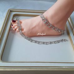 Beautiful handcrafted Indian silver plated Clear CZ Crystal Zircon pair of anklets traditionally called payals or ghanjar. Stunning multi layer design anklets. It is a beautiful ornament worn around the ankle. You can worn it on one foot or as a pair on both feet. It is sure to make your feets look beautiful. Main Colour: Silver Length: 26cm Closer: Hook clasp with bells. Package Includes: 1 pair of anklets Wedding Toe Ring Metal Anklets, Jhanjar Anklets, Anklets Silver, Anklets Indian, Bridal Anklet, Wedding Anklets, Wedding Necklace Set, Sapphire Necklace Pendants, Anklets Boho