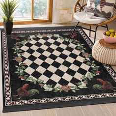 a black and white checkered area rug in a room with a potted plant