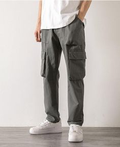 Step out in style with these straight leg cargo pants. Designed with an elasticated waistband and a functional drawstring, these pants are crafted from durable cotton. The cargo-style pockets on the leg add a touch of utilitarian chic, making them a versatile addition to any man's wardrobe. Elasticated waistband with drawstring Men's pants Cotton Cargo-style pockets on leg Straight leg Straight Leg Cargo Pants, 90s Fashion Grunge, 2000s Style, Streetwear Grunge, Corsets And Bustiers, Aesthetic Look, Cargo Style, Dress For Short Women, Men's Wardrobe