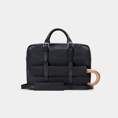 Part of our Archive Collection, this is the prior model of our award-winning Cary Briefcase in the streamlined Slim size — on sale while supplies last. Elegant Black Briefcase With Leather Handles, Modern Black Briefcase With Leather Trim, Modern Black Briefcase With Leather Handles, Modern Rectangular Briefcase With Leather Trim, Black Leather-trimmed Briefcase For Business, Black Leather Trim Briefcase For Business, Business Briefcase With Leather Trim In Black, Black Briefcase With Leather Handles For Formal Use, Modern Office Briefcase With Palladium Hardware