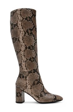 Bold snakeskin embossing puts an energetic spin on this look-defining knee-high boot grounded by a lightly cushioned footbed and flexible sole. 2 1/2" heel 15" shaft; 14" calf circumference Cushioned footbed iFlex technology provides 90-degree bend for superior comfort and flexibility Synthetic upper and lining/rubber sole Imported Knee High Boots Dress, Sneaker Dress Shoes, Tall Boots, Anne Klein, Snake Print, Dress With Boots, Shoe Brands, Shoe Collection, Knee High Boots