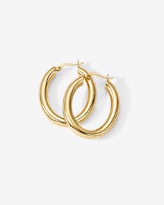 With an elongated sleek silhouette, these hoops are a must-have for the modern woman. Throw them on with a sundress in the summer, or turtleneck and updo in the winter, and look effortlessly chic. 925 Sterling Silver post14KT yellow, rose or white gold platedMeasurements: Width: 25mm (.98”); Height: 30mm (1.12”) Trendy Oval Hoop Earrings, Elegant Spring Hoop Earrings, Modern Summer Hoop Earrings, Elegant Everyday Spring Hoop Earrings, Chunky Jewelry, Toggle Bracelet, Beaded Anklets, Bracelet Collection, Chain Earrings