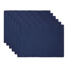 six navy blue placemats on a white background