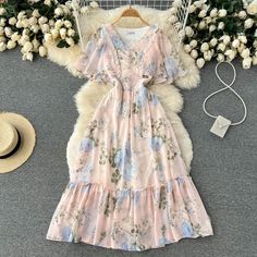 Lovely Floral Embroidered Sundress with Flowy Hem and V-Neckline Floral Embroidered V-neck Midi Dress For Vacation, V-neck Floral Embroidery Maxi Dress For Garden Party, Spring Floral Embroidered V-neck Midi Dress, Spring Floral Embroidery V-neck Midi Dress, Floral Embroidered V-neck Maxi Dress For Brunch, V-neck Floral Embroidered Dress For Spring, Spring V-neck Dress With Floral Embroidery, V-neck Floral Embroidery Maxi Dress For Brunch, Casual V-neck Maxi Dress With Floral Embroidery