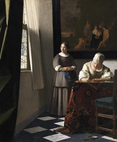 an old woman writing in front of a painting